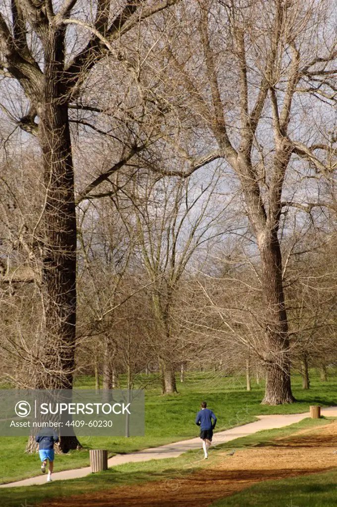 Men jogging. Hyde Park. London. United Kingdom.