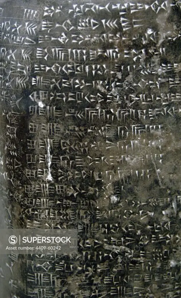 Mesopotamian Art. Middle Babylonian. Limestone kudurru from the riegn of Marduk-nadin-ahhe (1099Ð1082 BC). Block of black limestone. Detail. Inscribed with cuneiform script. Land grant. British Museum. London. United Kingdom.