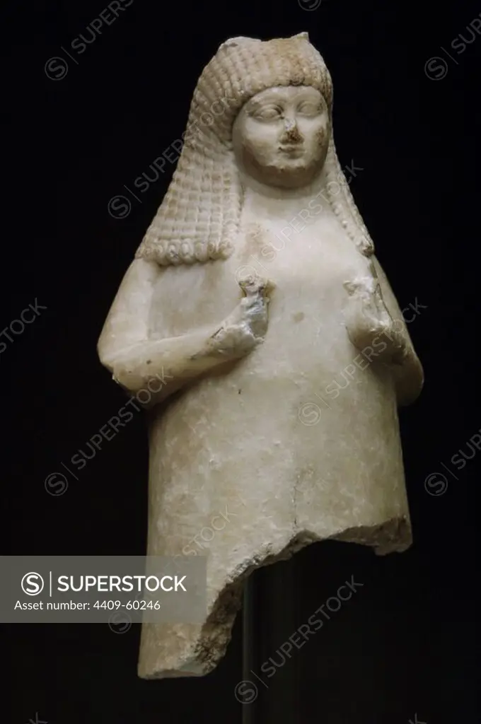 Mesopotamian Art. Alabaster flower vase shaped as a woman holding flowers. Dated between 700-600 B.C. It comes from Sippar. British Museum. London. England. United Kingdom.