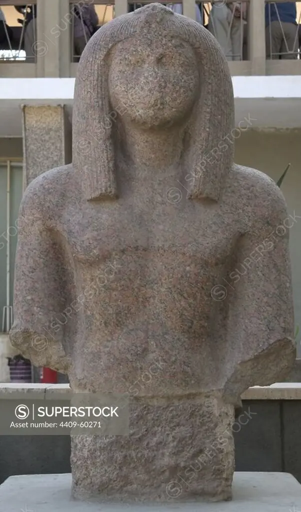 Egyptian Art. Pink granite statue. Mit Rahina Open Air Museum. Memphis. Egypt.
