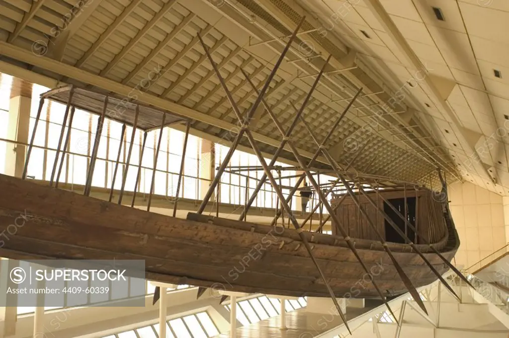 Egyptian art. Old Kingdom. IV Dynasty. The Khufu ship. It was sealed into a pit in the Giza pyramid complex at the foot of the Great Pyramid of Giza around 2500 BC. Built of cedar wood in order to transport the pharaoh to the afterlife. The Khufu Boat Museum. Giza.