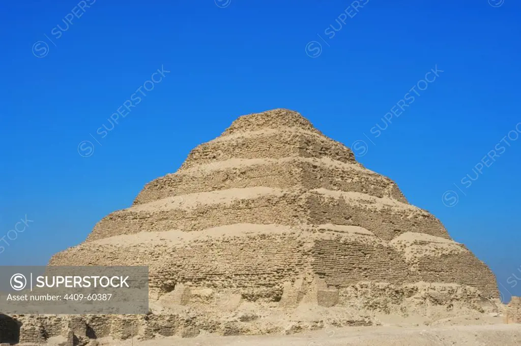 Egypt. Saqqara necropolis. The Pyramid of Djoser (Zoser) or step pyramid. Built in 27th century BC as a burial of Pharaoh Djoser by Imhotep, his vizier. Third dynasty. Old Kingdom.