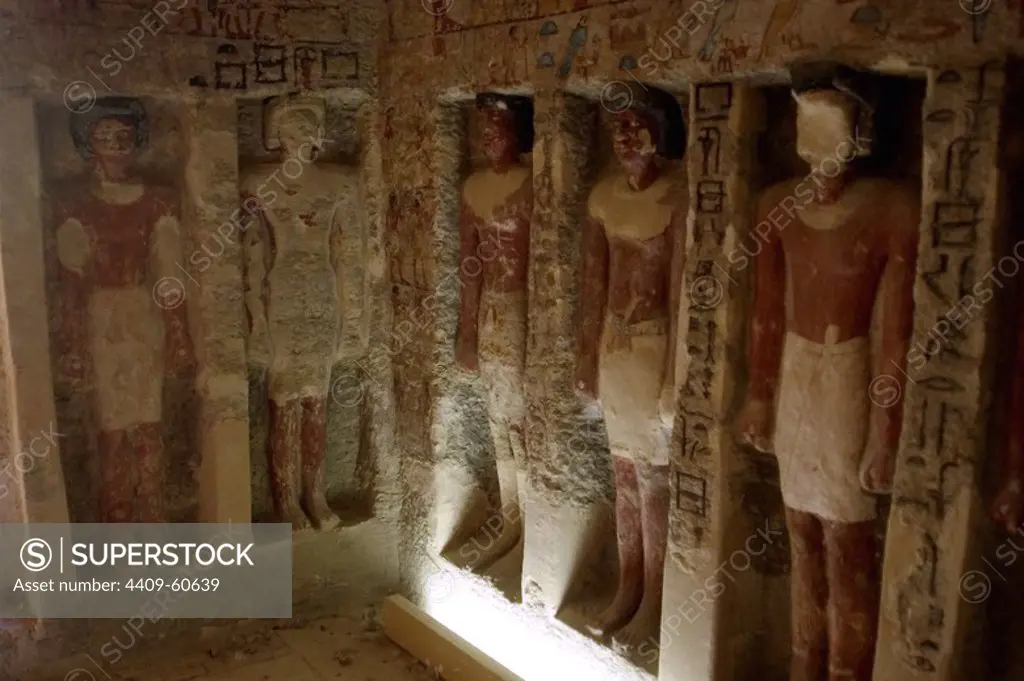 Egyptian Art. Necropolis of Saqqara. Mastaba. Room decorated with sculptures and hieroglyphs polychromed. 5th Dynasty. Old Kingdom. Egypt.