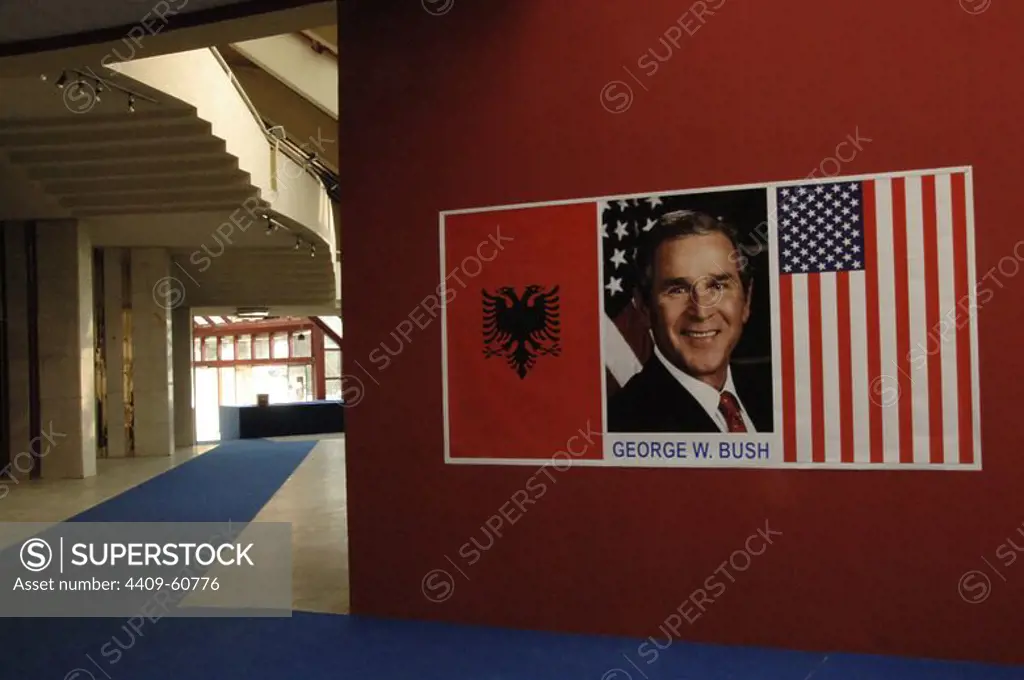 Poster of George Bush, along with the flags of Albania and the United States. Bush visited Albania in 2007. Enver Hoxha Museum. Albania. Tirana.