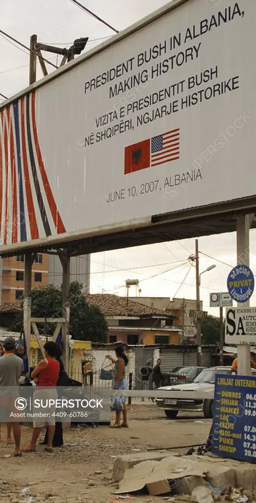 Poster commemorating the visit of President George Bush in Albania ( June 10, 2007). Posted in Albanian and English. Bus Station. Tirana. Albania.