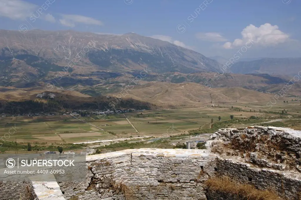 Albania. Gjirokastra city. Scenery. Drim river valley and Lunxheria mountains from the castle.