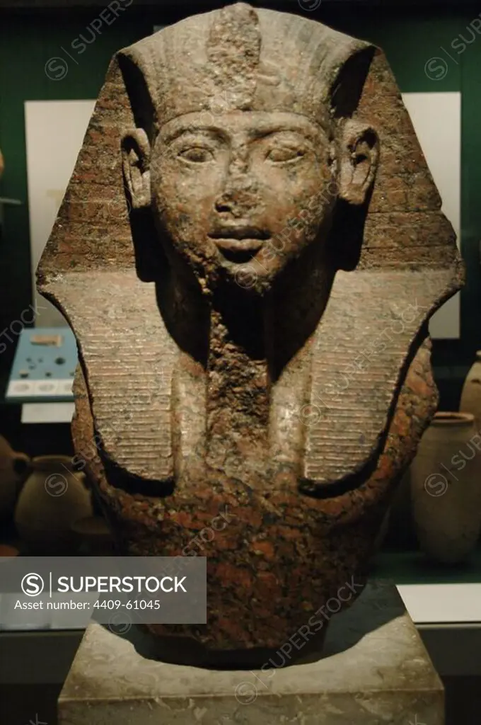 Bust of Pharaoh, possibly Ramses II. Dated c. 1250 BC. Red granite. New Kingdom. 19th Dynasty. British Museum. London. United Kingdom.