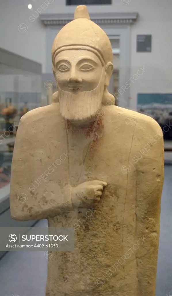 Limestone statue of a bearded workshipper. 575-550 BC. From the Sanctuary of Apollo at Phrangissa, Tamassos (Cyprus). British Museum. London. United Kingdom.