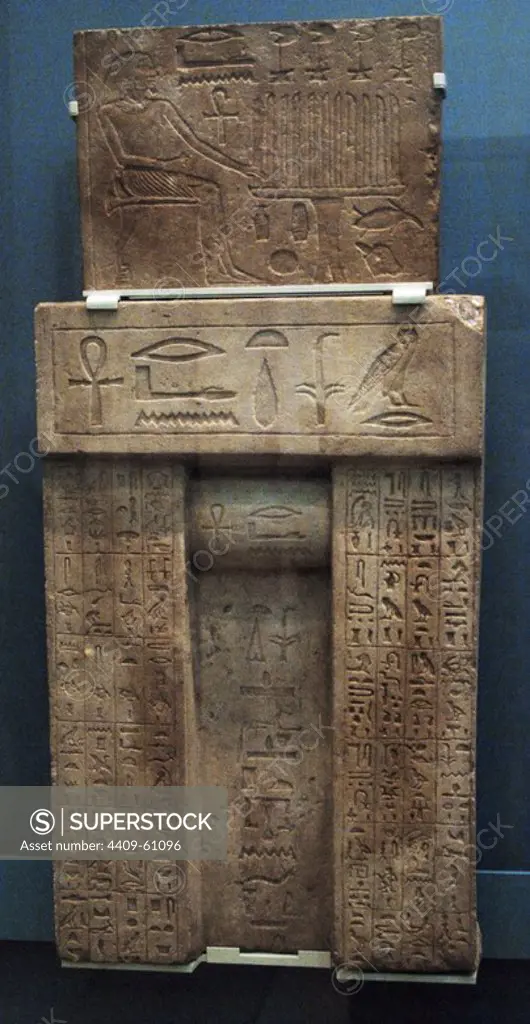 Nyankhre false door stela. 2450 BC. Limestone's small false door from the mastaba of the hairdresser's superintendent of the Palace Niankhre. The relief on the top panel depicts the deceased seated before an offerings table. The central niche and the sides of the door are decorated with hieroglyphic inscriptions of funerary offerings to the god Anubis. 5th Dynasty. Old Kingdom. From Saqqara. British Museum. London. United Kingdom.