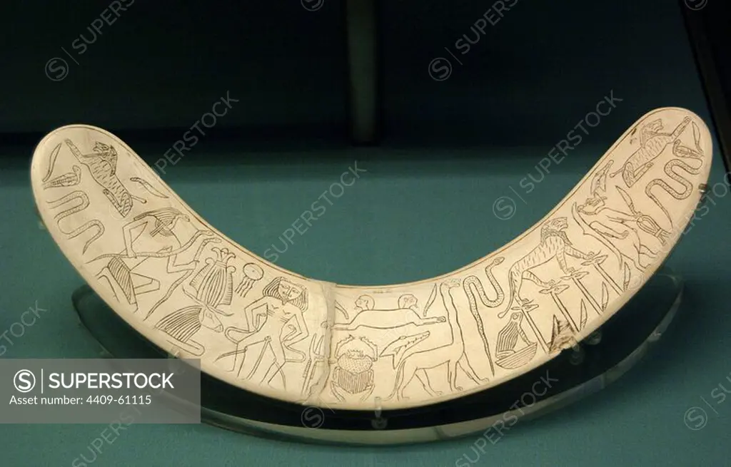 Magical wand of ivory of hippopotamus tusk with images depicting deities and protective spirits to ward off evil spirits. To provide magical protection for mother and child. 1750 BC. 12th Dynasty. Middle Kingdom. From Thebes. British Museum. London. United Kingdom.