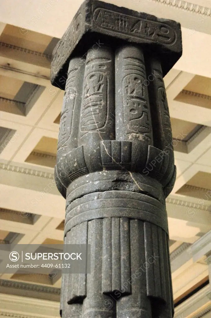 Papyriform column of grey granite. The abacus has the name of King Amenhotep III and the axis shows the name of Merneptah of the 19th Dynasty. The last name of the column is the king Sethnakhte of 20th Dynasty. 1500 BC. 18th Dynasty. New Kingdom. British Museum. London. United Kingdom.