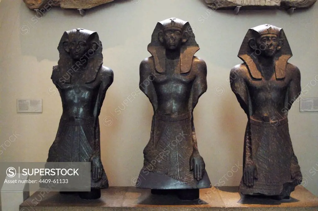 Three black granite statues of Sesostris III. 1850 BC. 12th Dynasty. Middle Kingdom. From the Temple of Mentuhotep, Lower South Court. Deir el-Bahri, Thebes. British Museum. London. United Kingdom.