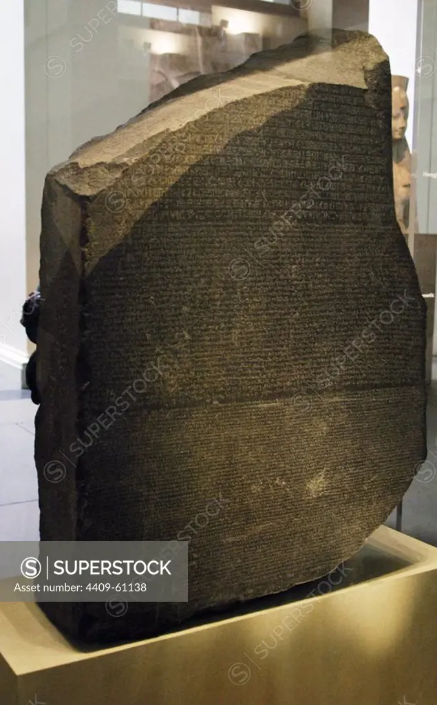 The Rosetta Stone. Fragment of a black granite stele with an inscription in different languages __of a decree of Ptolemy V Epiphanes king. Ptolemaic era. 196 BC. Writing in hieroglyphical, demotic and greek scripture. British Museum. London. United Kingdom.