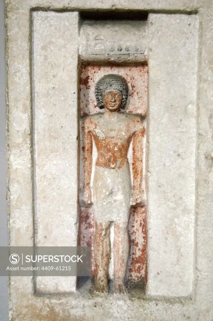 Limestone false door of Bateti. The figure inside the niche depicts the deceased out of his grave to receive their offerings. 2400 BC. 5th Dynasty. Old Kingdom. British Museum. London. United Kingdom.