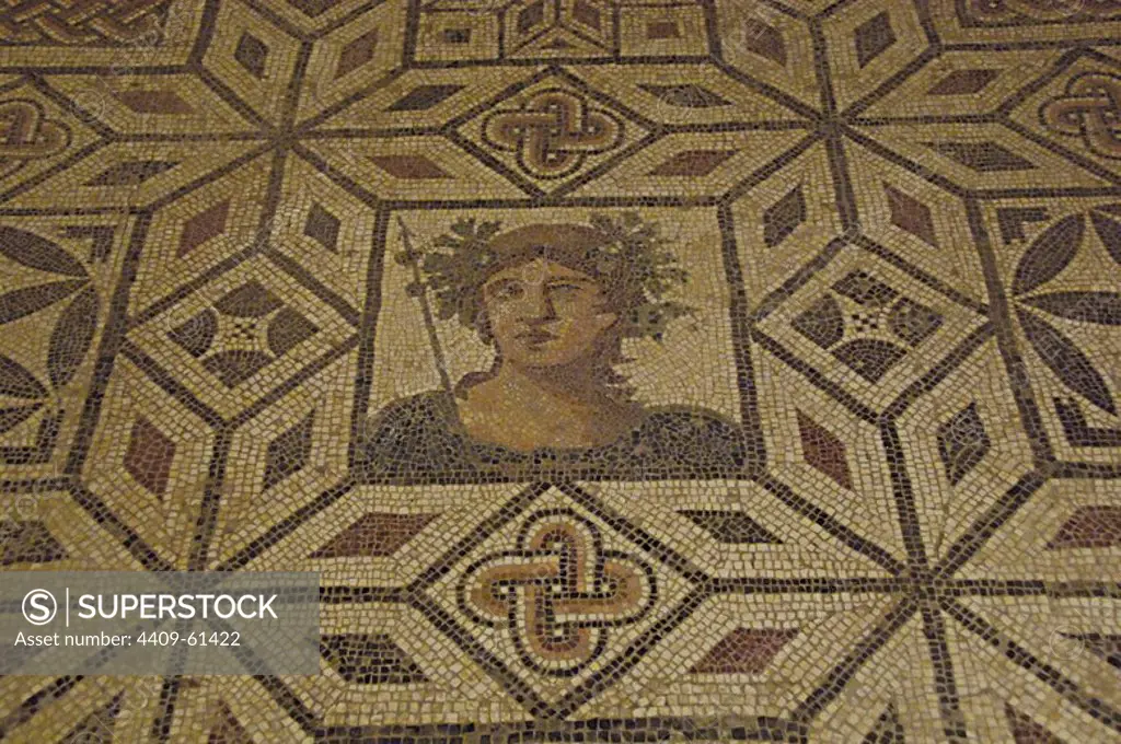 Roman Art. Spain. Mosaic of Bacchus. 2nd century A.C. It comes from Italica (Seville). Bacchus crowned with vine leaves and armed with thyrsus topped with the spearhead. Archaeological Museum of Seville. Andalusia.