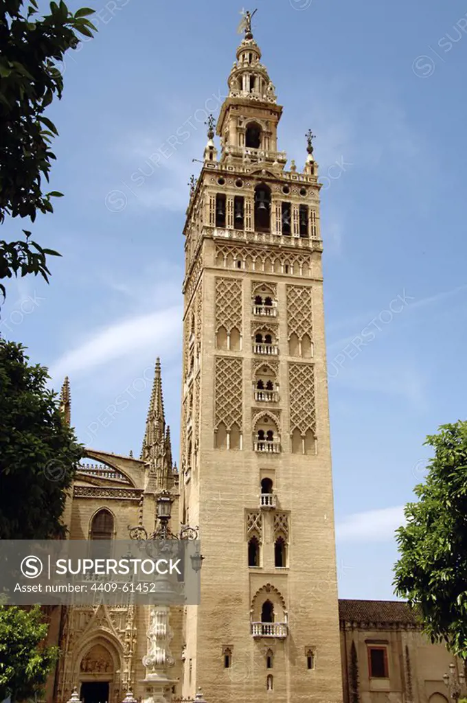 Spain. Andalusia. Seville. View of the Giralda tower, (1184-1198). 12th century. Minaret of the old mosque of the city and current bell tower of the cathedral. The tower's first two-thirds is a former minaret from the Berber Almohad period of Seville, the upper third Spanish Renaissance architecture.