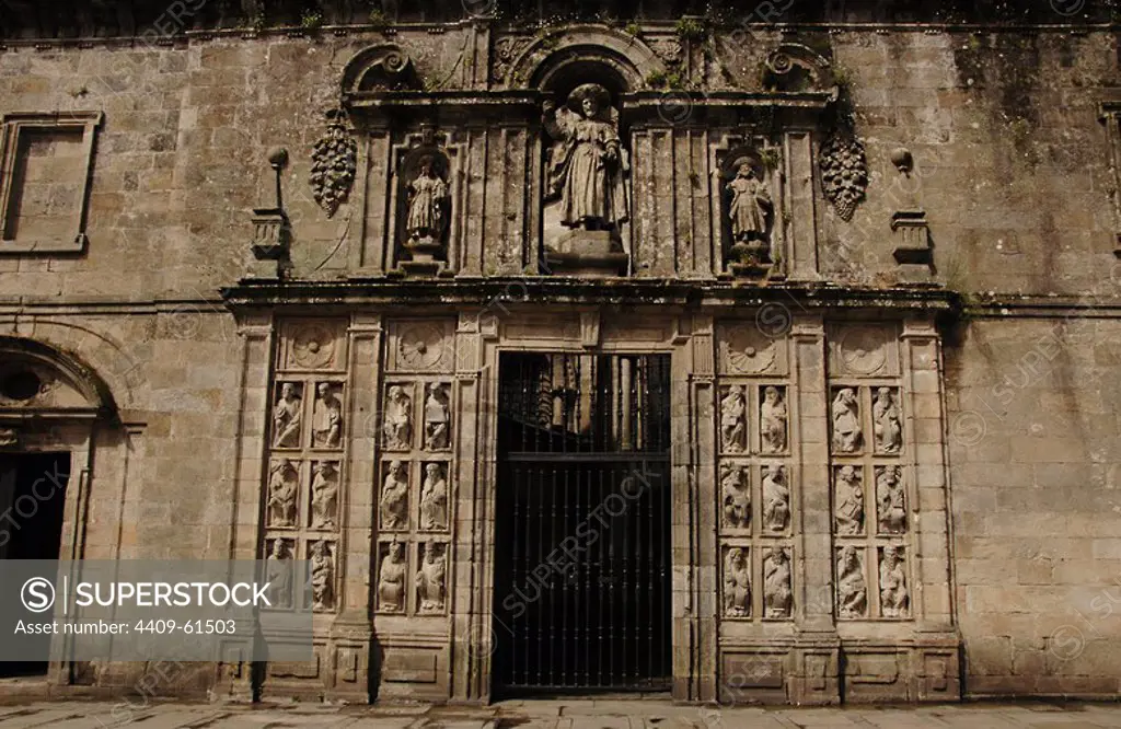 Santiago de Compostela, La Coruna province, Galicia, Spain. The Cathedral. Holy Door or Door of Pardon (1611). It is only opened in Jubilee Years. The niches contain the image of St. James and his disciples Athanasius and Theodore at his side (Baroque style). On the bottom and sides of the door were placed 24 figures of prophets and apostles coming from the old stone choir of Master Mateo (Romanesque style). East facade.