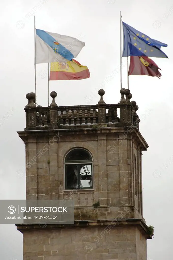Spain. Galicia. Santiago de Compostela. Flags of Spain, Galicia, European Union and the city of Santiago de Compostela waving in a tower.