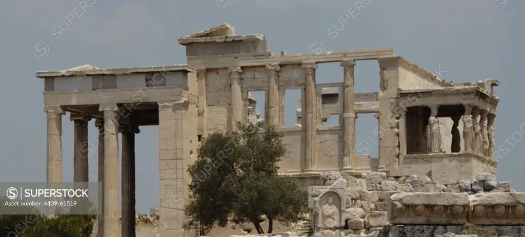 Greece. Athens. Acropolis. Erechtheion. Ionic temple which was built in 421 BC by Athenian architect Mnesicles (Pericles Age). Kariatides (Porch of the Caryatids). General view.