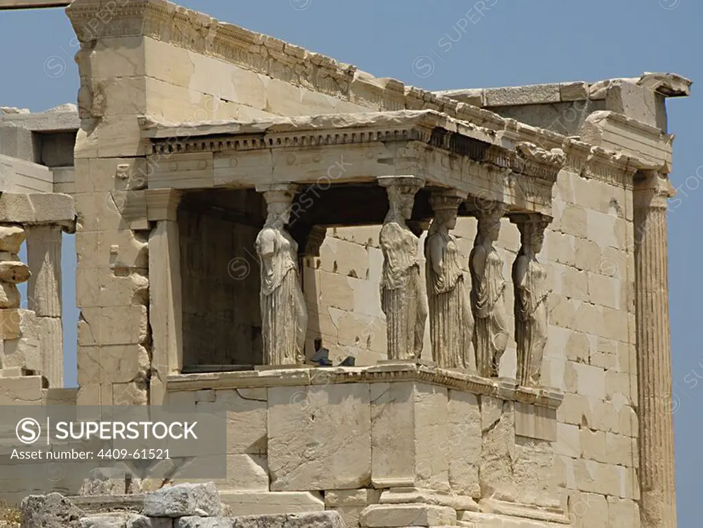 Greece. Athens. Acropolis. Erechtheion. Ionic temple which was built in 421 BC by Athenian architect Mnesicles (Pericles Age). Kariatides (Porch of the Caryatids).