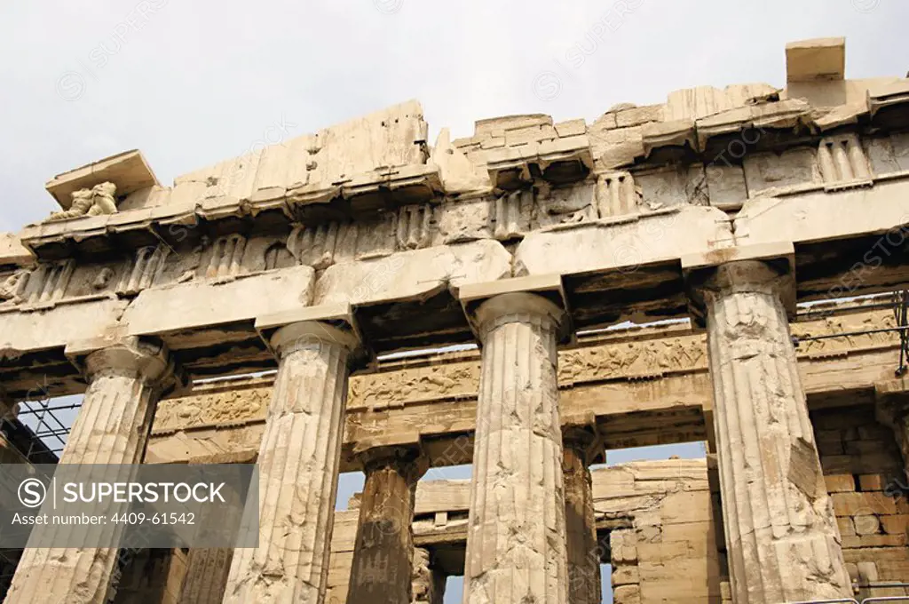 Greece. Athens. Acropolis. Parthenon. Classical temple dedicated to Athena. 447 BC-432 BC. Doric order. Architects: Iktinos and Callicrates. Sculptor Phidias. Pediment, establature with frieze, triglyph, metope, architrave, capital and columns. Architectural detail.