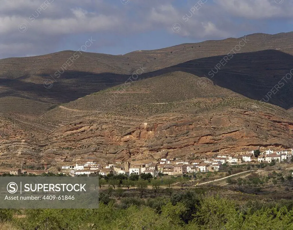 Spain. La Rioja. Santa Eulalia Somera. Panoramic view of the town. On the slope of the mountain, the ancient hermits caves stand out. Arnedo Comarca.