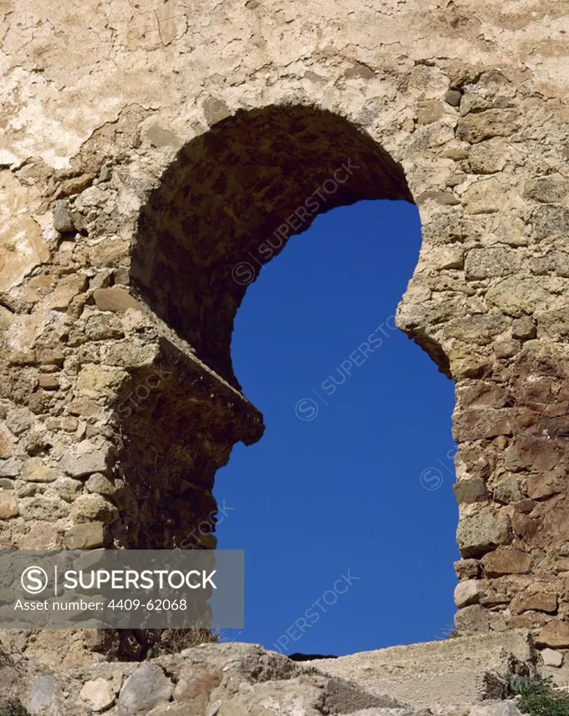 Horseshoe arch of the gateway to the castle of Clavijo. La Rioja. Spain.