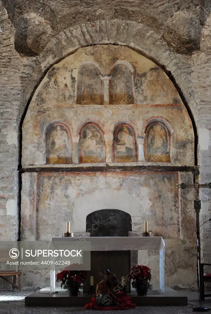 Pre-romanesque Church of Saint Peter. 8th-12th centuries. Central apse with frescoes depicting Saint Peter, Jesus and the four evangelists, 11th century. Terrassa. Catalonia. Spain.