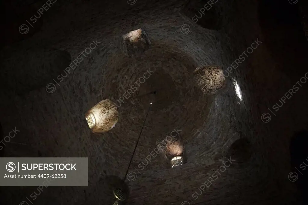 Romanesque Art. Spain. Church of St. Michael (San Miguel). Domed dome supported by eight columns made with Visigothic fragments and four Romanesque capitals. Inside view. Tarrasa. Catalonia.