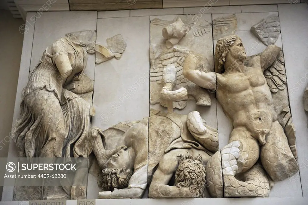 Pergamon Altar. Built by order of Eumenes II Soter. 164-156 BC by artists of the school of Pergamon. Marble and limestone. North frieze. Aphrodite and Eros fighting with a giant. The goddess pulls a lance out of a dead giant. Pergamon Museum. Berlin. Germany.