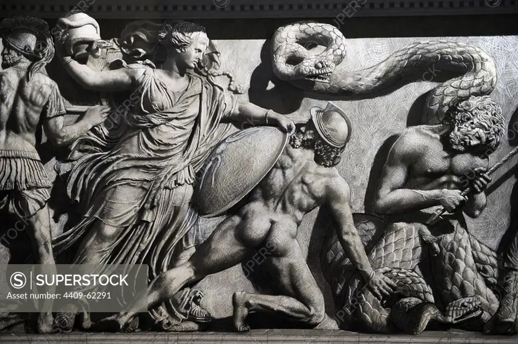 Pergamon Altar. Yadegar Asisi (born 1955). Artistic attempt to restore the North Frieze using the part of the frieze not shown in the panorama in order to complete the figures and scenes. Gigantomachy. Goddess, identified as Nyx, with a pot in hand to be used as a projectile, surrounded by snakes. Pergamon Museum. Berlin. Germany.