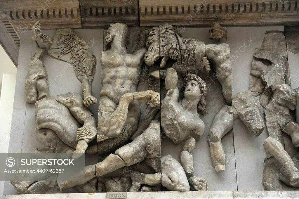 Pergamon Altar. Built by order of Eumenes II Soter. 164-156 BC by artists of the school of Pergamon. Marble and limestone. Gigantomachy. West frieze. Left to right: Amphitrite and his son Triton fighting the giants. Pergamon Museum. Berlin. Germany.