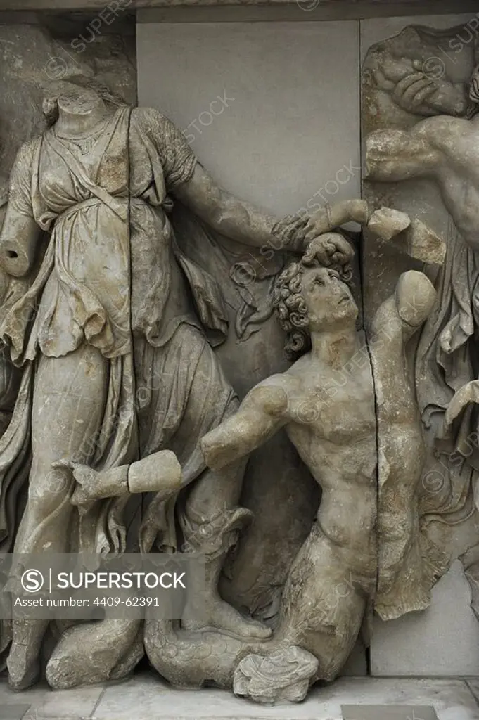 Pergamon Altar. Built by order of Eumenes II Soter. 164-156 BC by artists of the school of Pergamon. Marble and limestone. Gigantomachy. West frieze. Detail. Doris and a giant. Pergamon Museum. Berlin. Germany.
