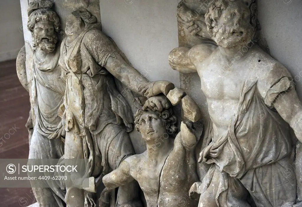 Pergamon Altar. Built by order of Eumenes II Soter. 164-156 BC by artists of the school of Pergamon. Marble and limestone. Gigantomachy. West frieze. Detail. Left to right: Nereus, Doris, giant and Oceanus. Pergamon Museum. Berlin. Germany.