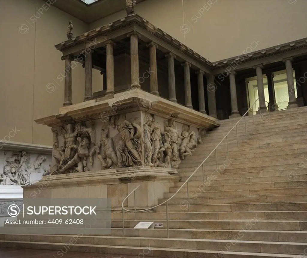 Pergamon Altar. Built by order of Eumenes II Soter. 164-156 BC by artists of the school of Pergamon. Marble and limestone. Gigantomachy. West frieze. Left to right: Amphitrite and his son Triton fighting the giants. Nereus, Doris, giant, Oceanus, and Thetis. Pergamon Museum. Berlin. Germany.