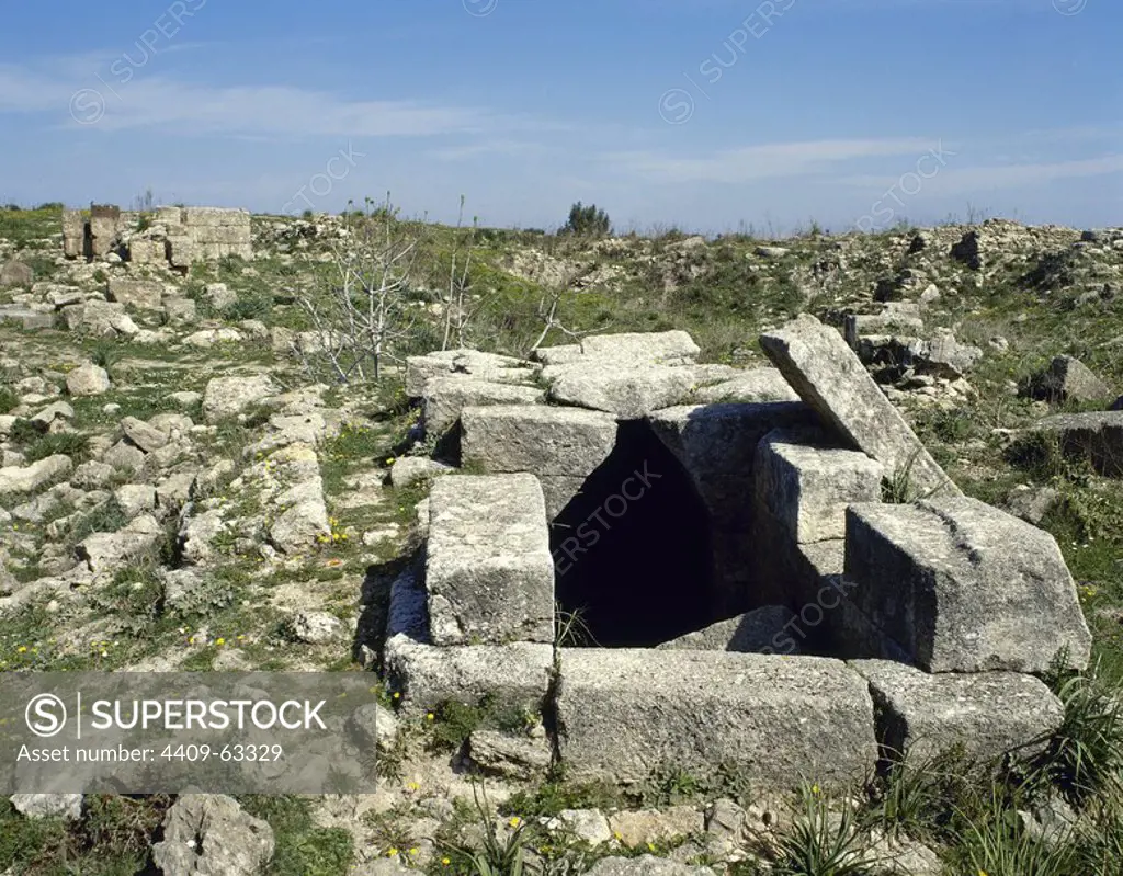Syria. Ugarit. Ancient port city at the Ras Shamra. Neolithic-Late Bronze Age. Well. Ruins.