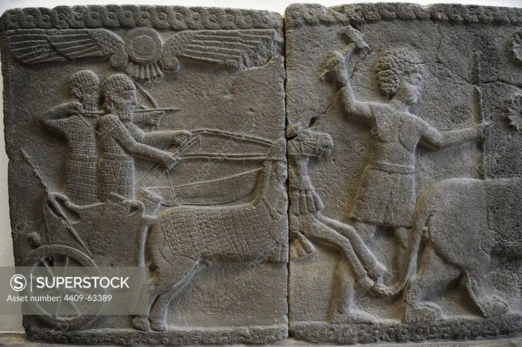 Hittite art. Orthostat. 8th century BC. Relief: Hunting scene with trolley. 750 BC. Found in old city of Sma'al /Zincirli (Turkey). Pergamon Museum. Museum Island. Berlin. Germany.