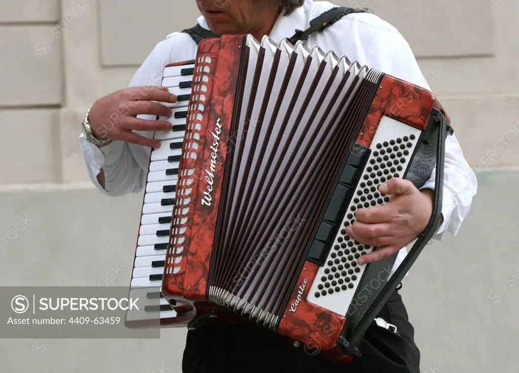 Accordion player in a street in the historic centre of Prague. Czech Republic.