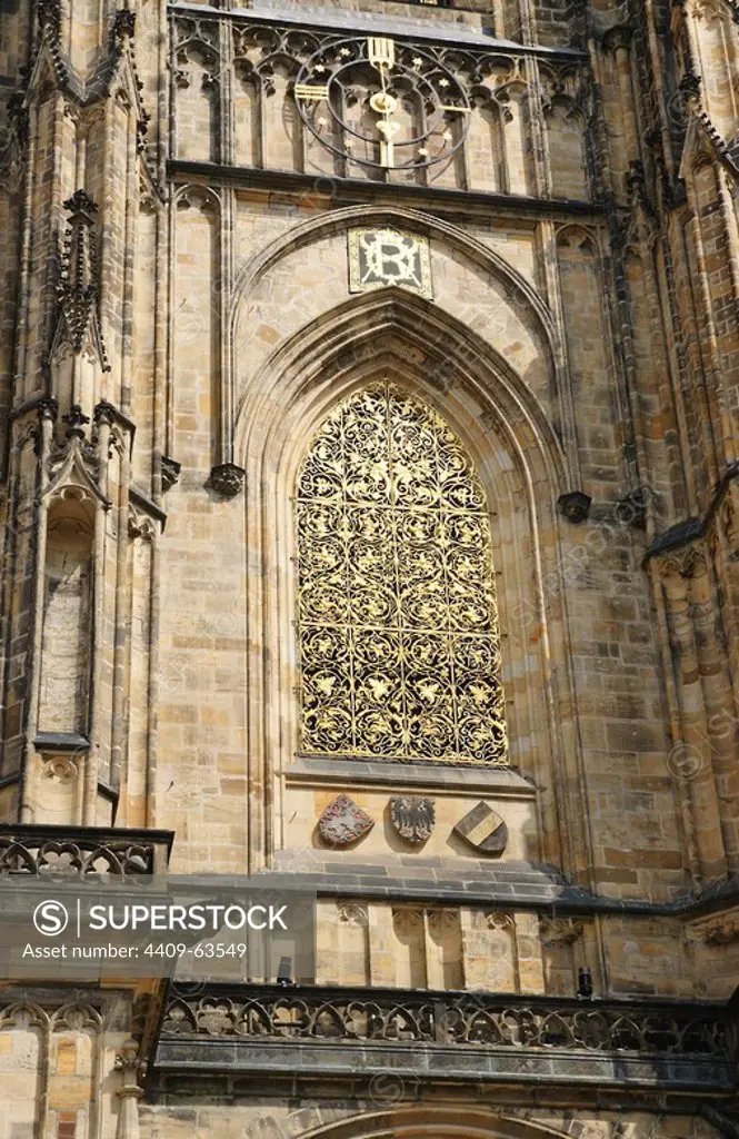 Czech Republic. Prague. St. Vitus Cathedral. Gothic style, 14th century. Main Tower, built by Peter Parler (1333-1399). Architectural detail of a window. Castle complex. Hradcany district.