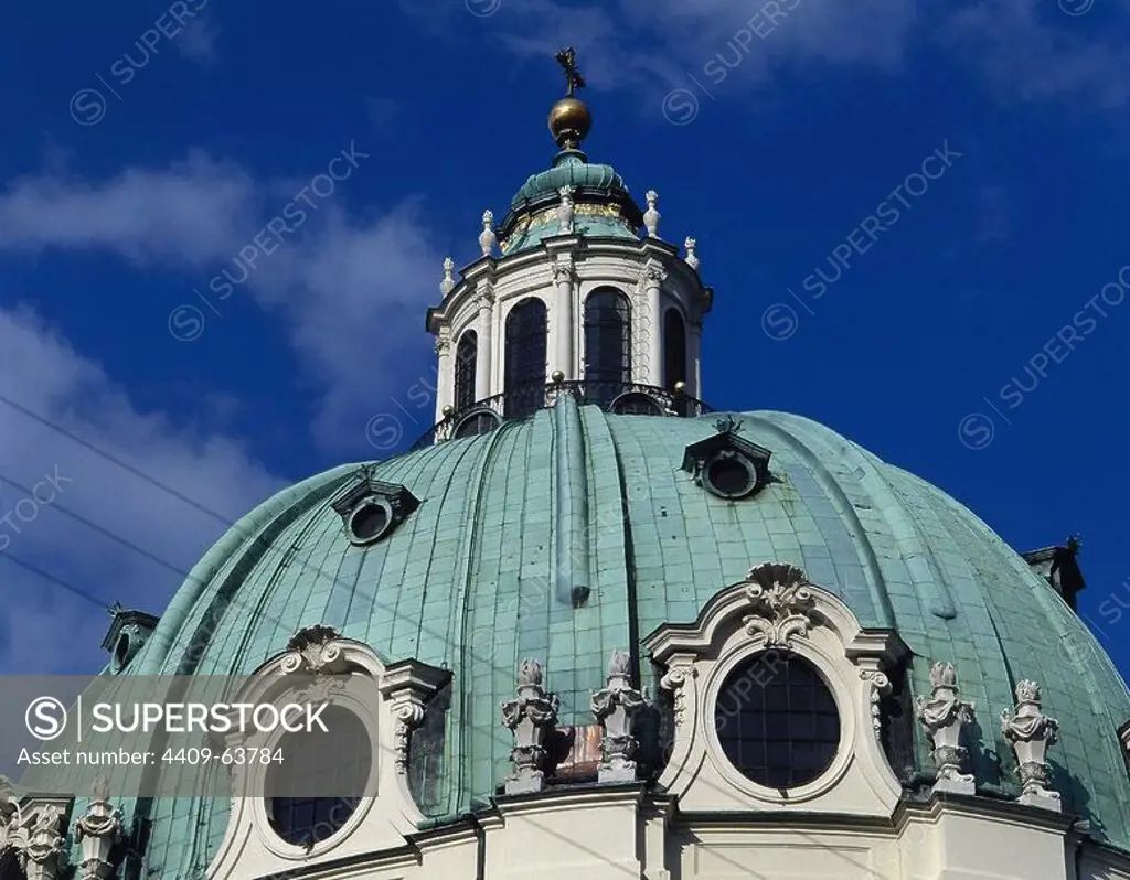 Johann Bernhard Fischer von Erlach (1656-1723). Karlskirche (St. Charles Church). Baroque style. 1716-1737. Dedicated to St. Charles Borromeo. Detail of the great dome crowned by a cross. Vienna. Austria.
