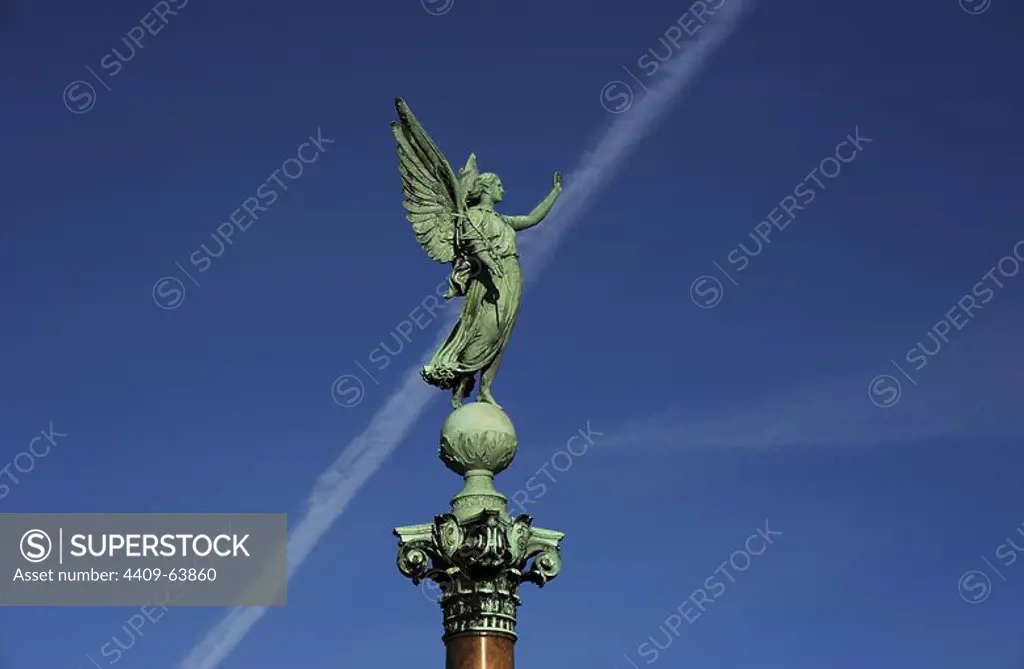 Memorial column dedicated to danish-norwegian naval officer Ivar Huitfeldt (1665-1710). Detail to the statue of Victory at the top of the column built by Ferdinand Edvard Ring. 19th century. Langelinie Park. Copenhagen. Denmark.