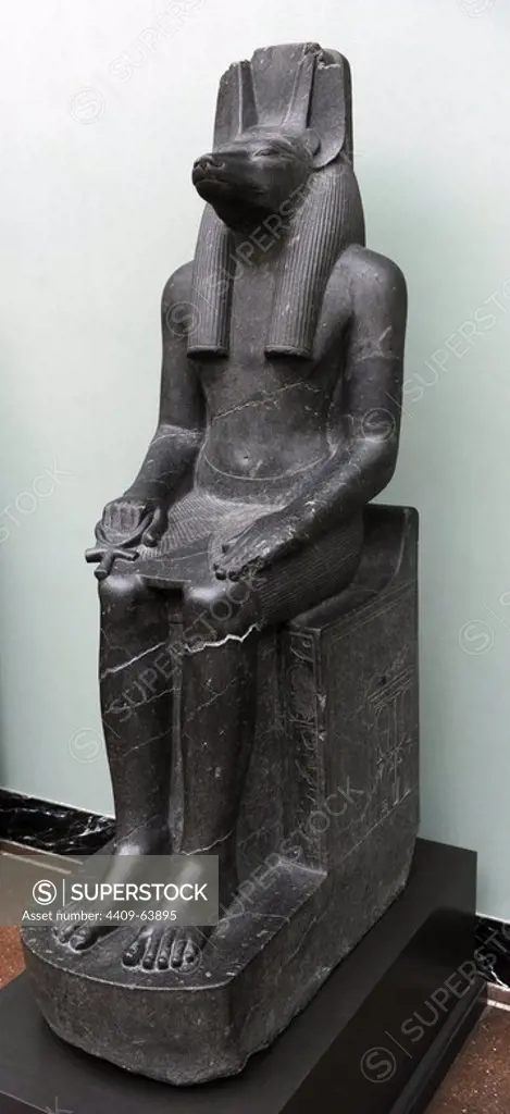 Statue of the jackal-headed god Anubis. Diorite. Reign of Amenophis III. 1403-1365 BC. 18th Dynasty. New Kingdom. From the Temple of Luxor. Ny Carlsberg Glyptotek. Copenhagen. Denmark.
