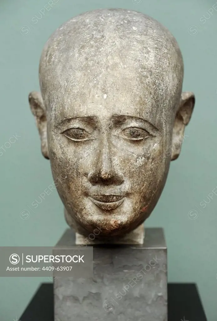 Head from a male statue. Limestone. Ptolemaic Period. 3rd century BC. Origin unknown. Ny Carlsberg Glyptotek. Copenhagen. Denmark.