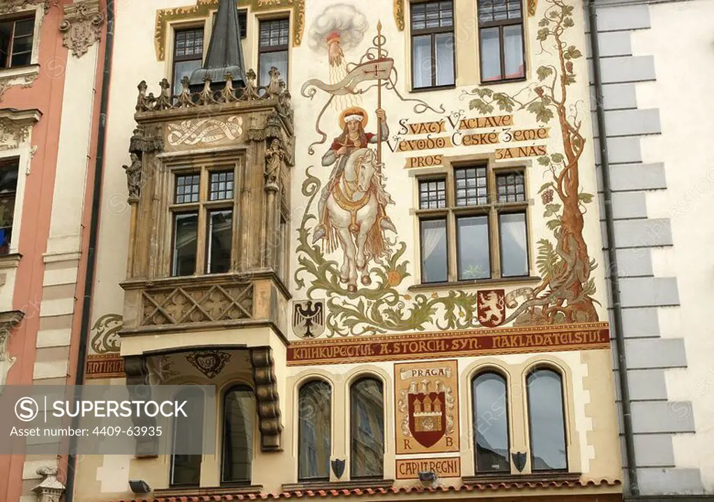 Czech Republic. Prague. The Storch House (No.16) Also called "At the Stone Virgin Mary". Facade adorned with figurative painting of St. Wenceslas on horseback. Designed by Mikolas Ales in the 19 th century. Neo-Renaissance. South facade of the Old Town Square (Staromestske mamesti).