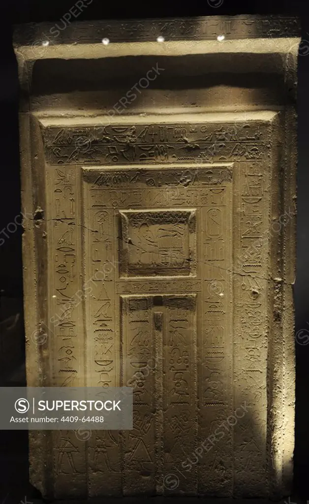 Egyptian Art. False-door of the Official Gemni-em-hat. From de tomb of Gemni-em-hat at Sakkara. Limestone. 11th-12th Dynasty. c 1990 BC. Middle Kingdom. Hieroglyphs. Ny Carlsberg Glyptotek. Copenhagen. Denmark..