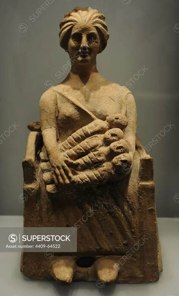 Ancient Greek Art. Archaic Period (700 B.C-480 B.C.). Goddesses rearing children. Terracotta. Statuette. Ny Carlsberg Glyptotek. Copenhagen. Denmark.
