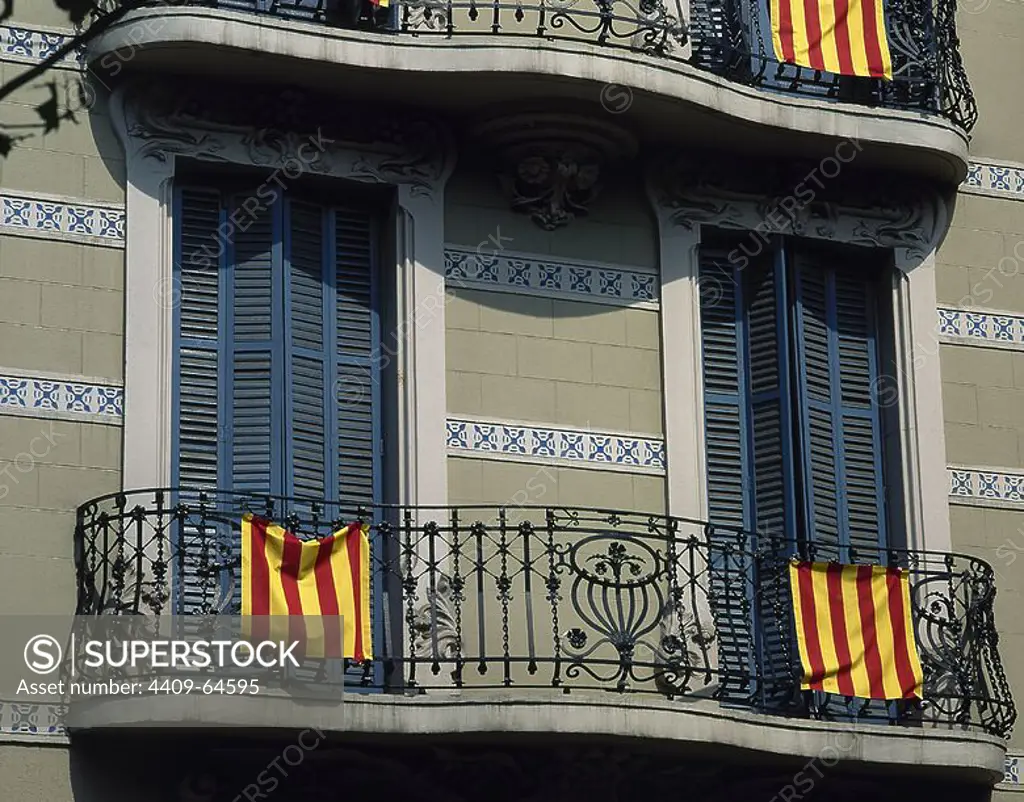 Spain. Barcelona. Catalan flags hanging from the balconies.