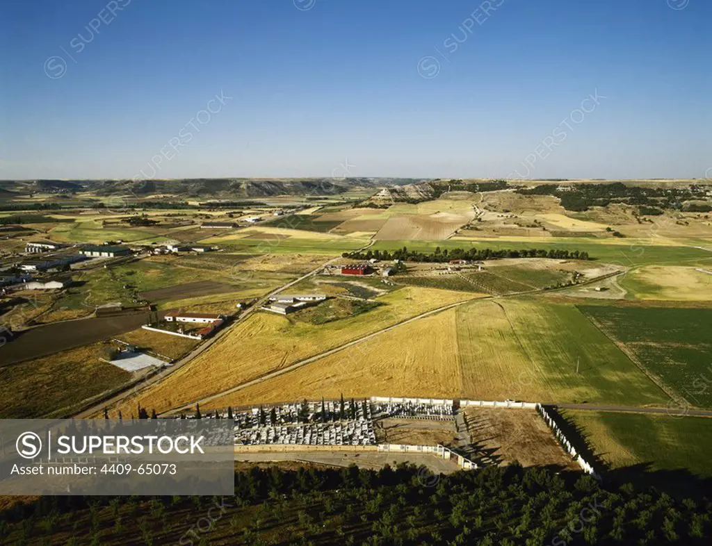 Spain. Castile and Leon. Province of Valladolid. Panoramic view of the Castilian landscape with crops and moorlands from the castle of Peafiel.