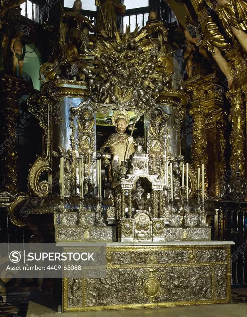 Main altar of the Cathedral of Santiago de Compostela. A bejeweled medieval stone statue of St. James (12th century). Remodeled, sitting on a silver chair and covered by a silver enclosure. Santiago de Compostela Cathedral. Santiago de Compostela, Province of La Corua, Galicia, Spain.