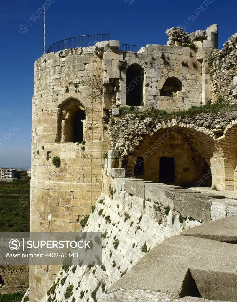 Syria. Talkalakh District, Krak des Chevaliers. Crusader castle, under control of Knights Hospitaller (1142-1271) during the Crusades to the Holy Land, fell into Arab control in the 13th century. View of one of the turrets. Photo taken before the Syrian Civil War.